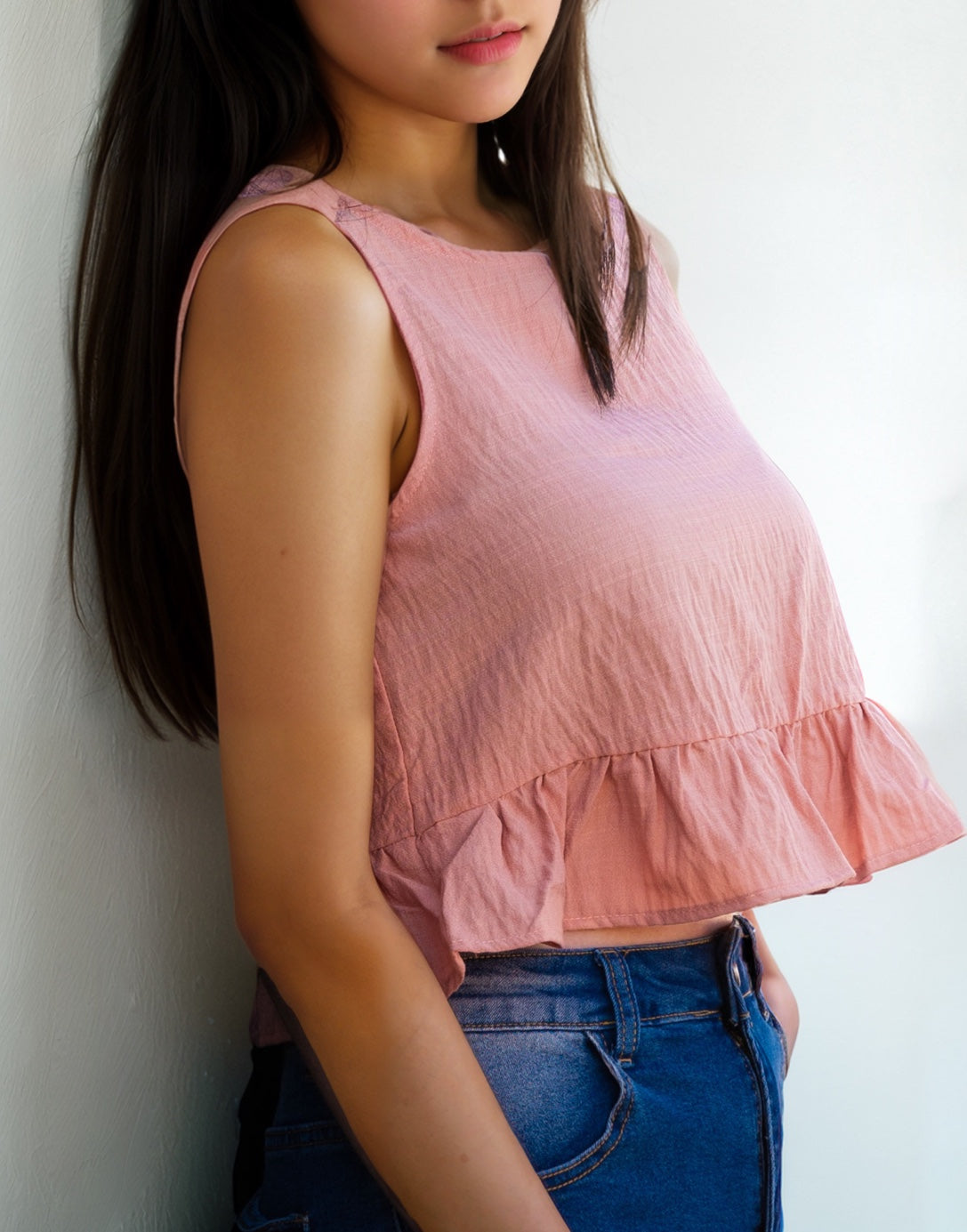 Side view of Ruffle crop top.