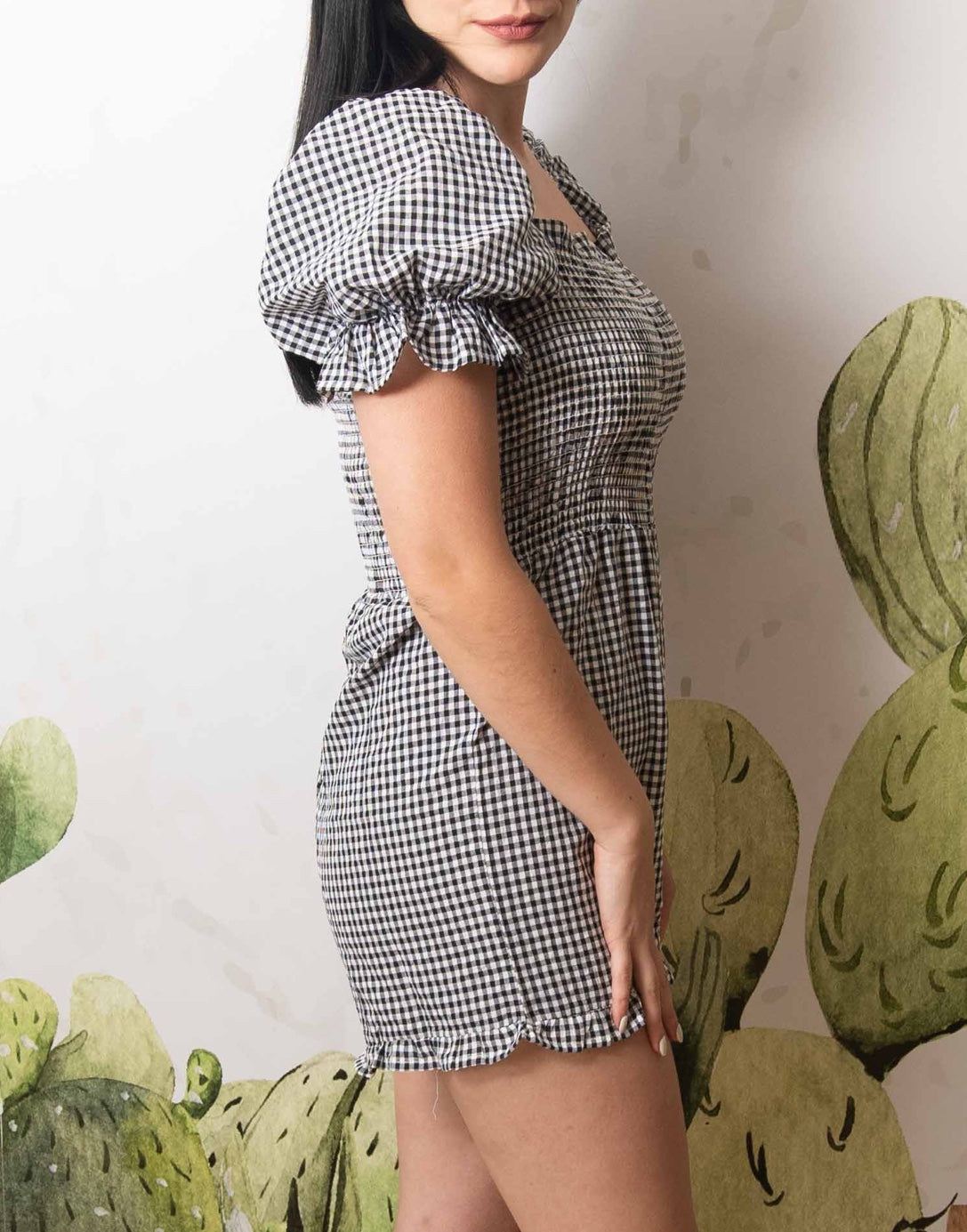 Side view of Shirred Puff Sleeve Romper.