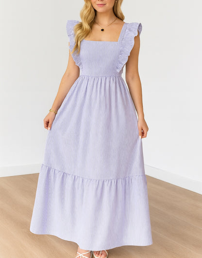 Woman wearing a light purple Square Neck dress with ruffled sleeves on a white background.