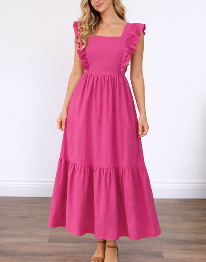 Woman wearing a pink Square Neck Maxi Dress with ruffled sleeves on a white background.