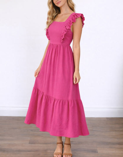 Side view of woman wearing a pink Square Neck Maxi Dress with ruffled sleeves on a white background.