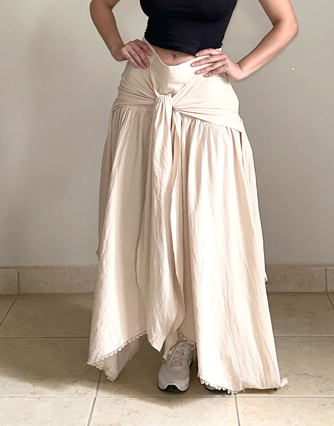 Front view of Tie Front Asymmetrical Hem Skirt.