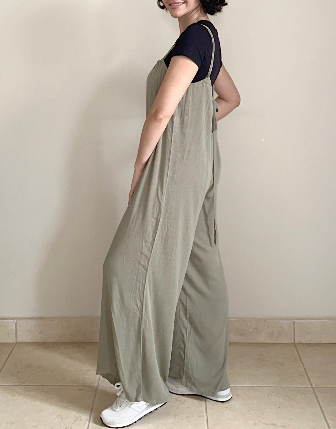 Side view of Wide Leg Suspender Jumpsuit.