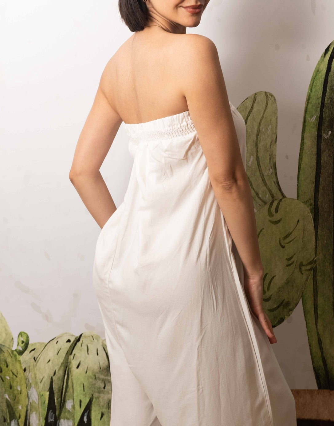 Side view of Wide Leg Tube Jumpsuit.